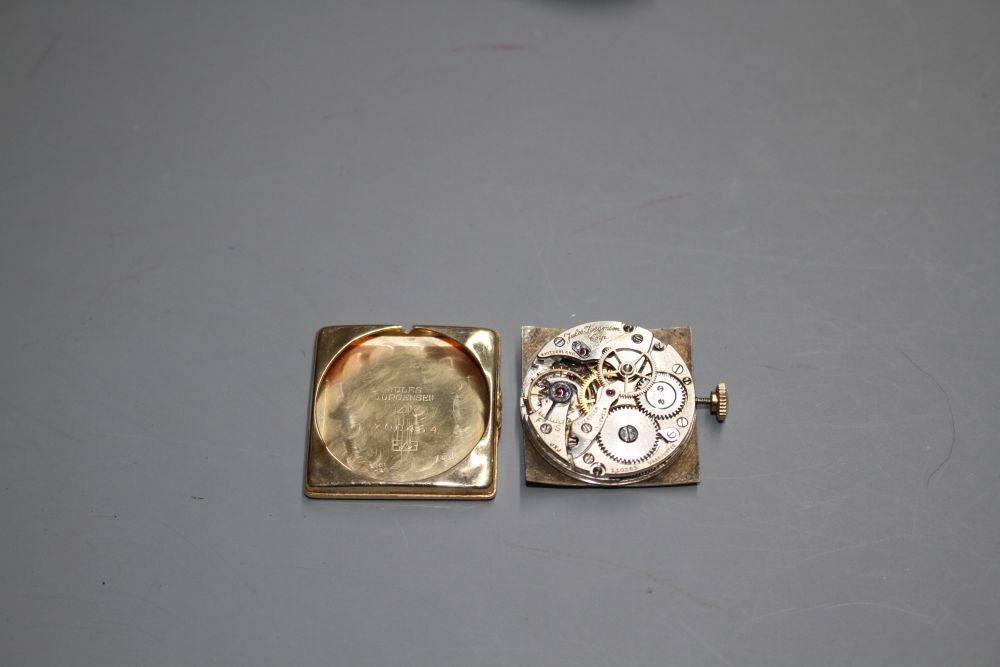 A gentlemans 1950s? 14k Jules Jurgensen manual wind wrist watch, with square tumbling Roman dial,